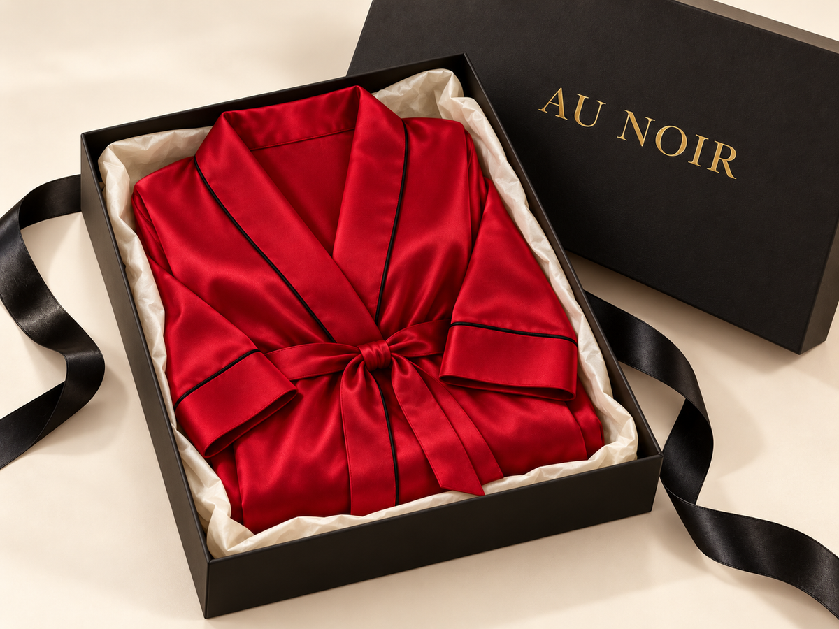 Red satin dressing gown with black piping and tie waist maxi